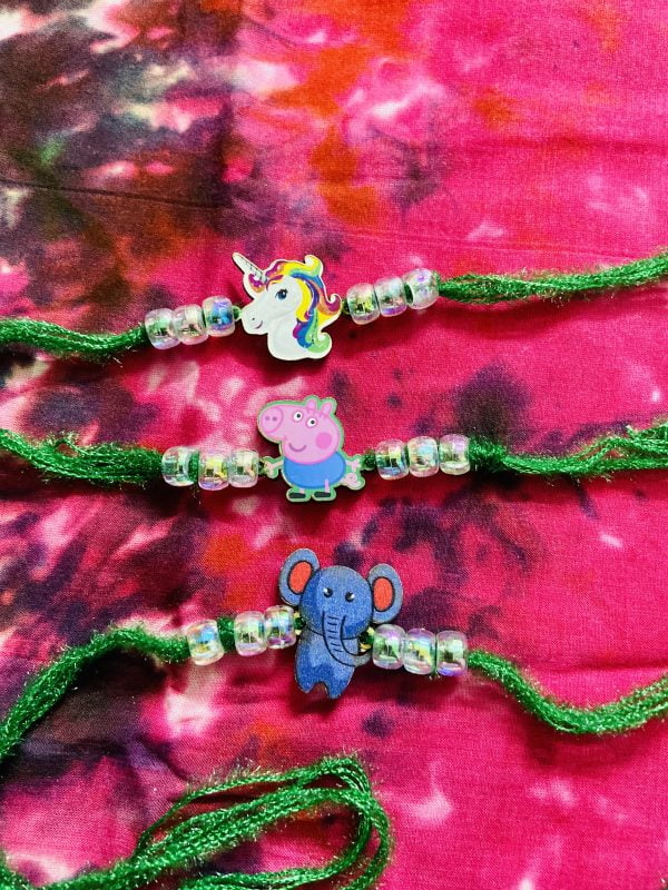 Kids Rakhi featuring the magnetic cartoon characters Unicorn, Elephant, and Peppa Pig is a fun way to show your love this rakshabandhan. Tie a lovely traditional Rakhi around your wrist to cement your familial ties for life.